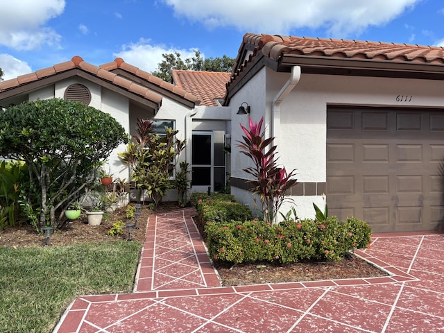 view of front of house with a garage