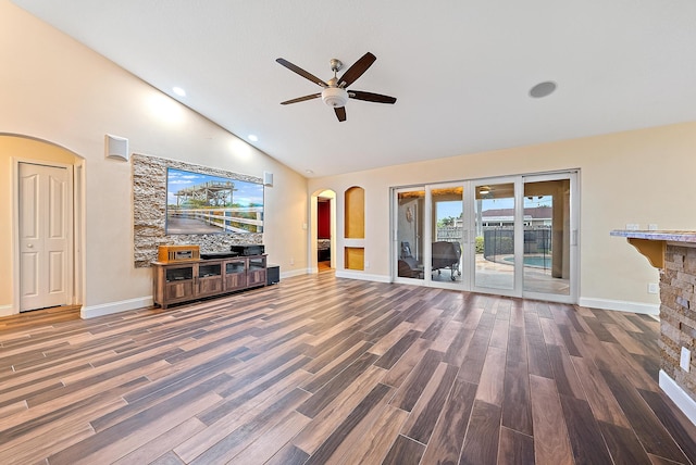 unfurnished living room featuring ceiling fan, high vaulted ceiling, french doors, and hardwood / wood-style floors