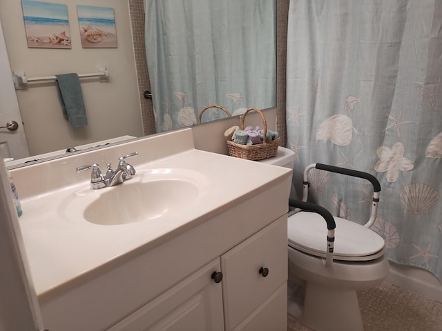 bathroom with vanity, toilet, walk in shower, and tile patterned flooring