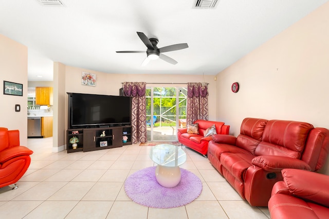 tiled living room featuring ceiling fan