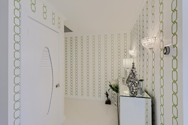 bathroom with vanity and ornamental molding