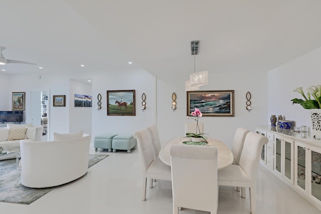 dining room featuring ceiling fan