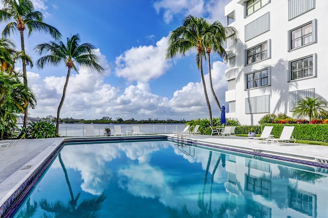 view of swimming pool with a patio