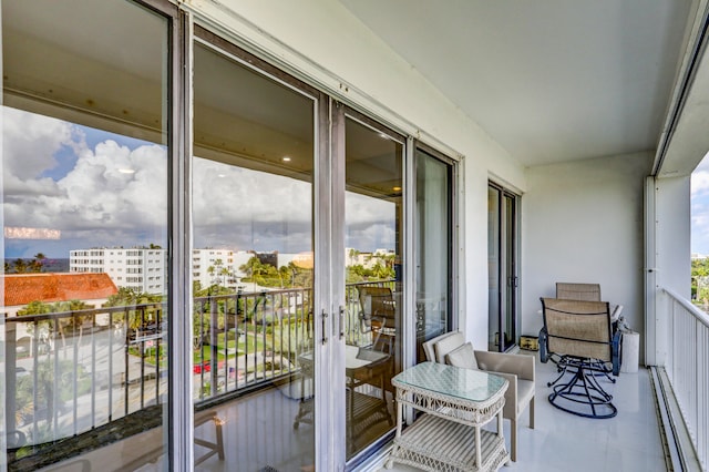 balcony featuring a baseboard radiator