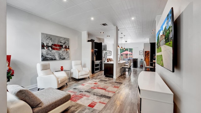 living room featuring light wood-type flooring