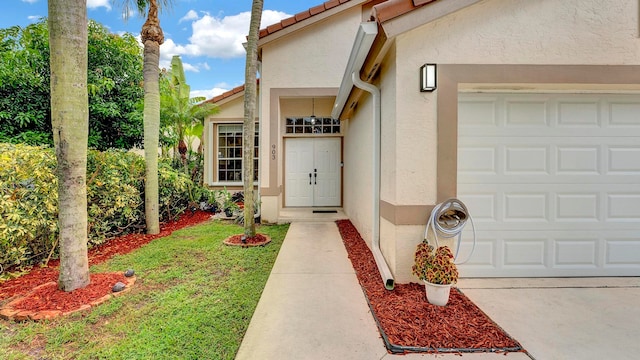 entrance to property with a garage