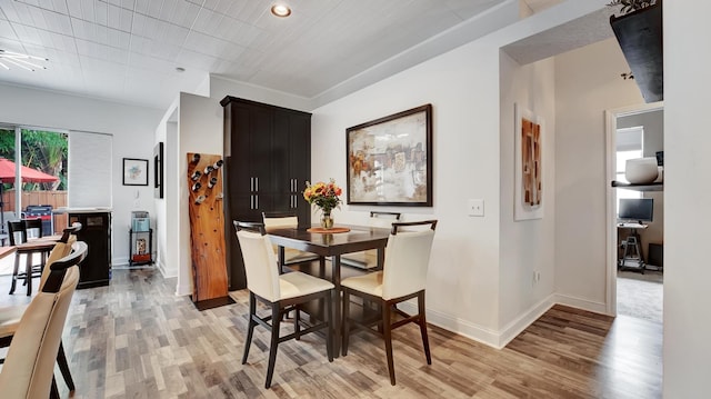 dining area with light hardwood / wood-style flooring