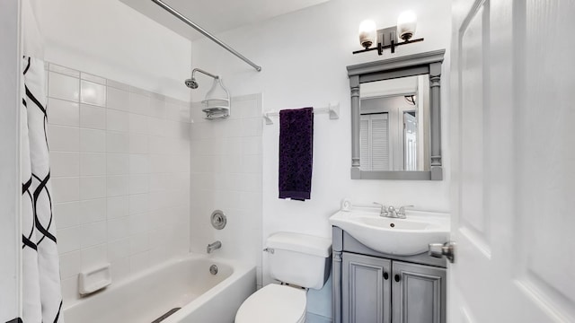 full bathroom with toilet, vanity, and shower / bath combo with shower curtain