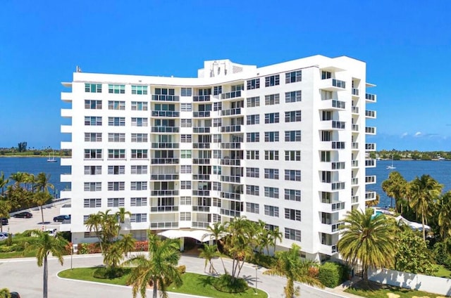 view of building exterior with a water view