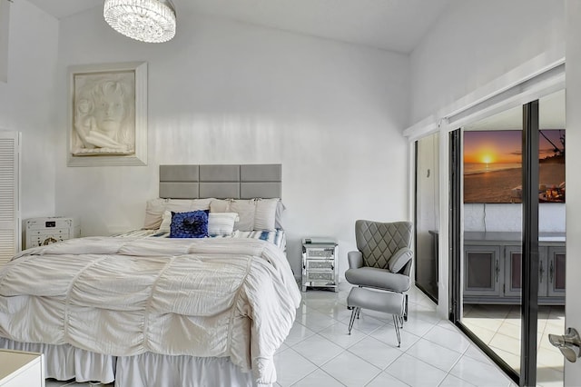 tiled bedroom featuring high vaulted ceiling