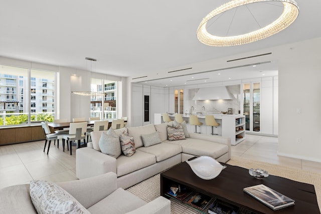 tiled living room featuring plenty of natural light