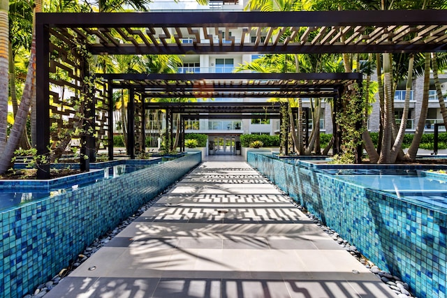 view of pool with a pergola