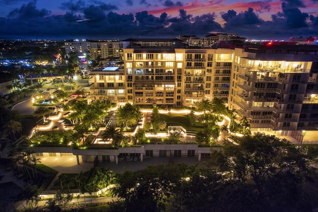 view of outdoor building at dusk