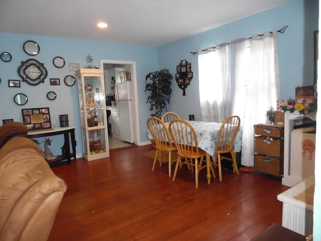 dining area featuring hardwood / wood-style floors