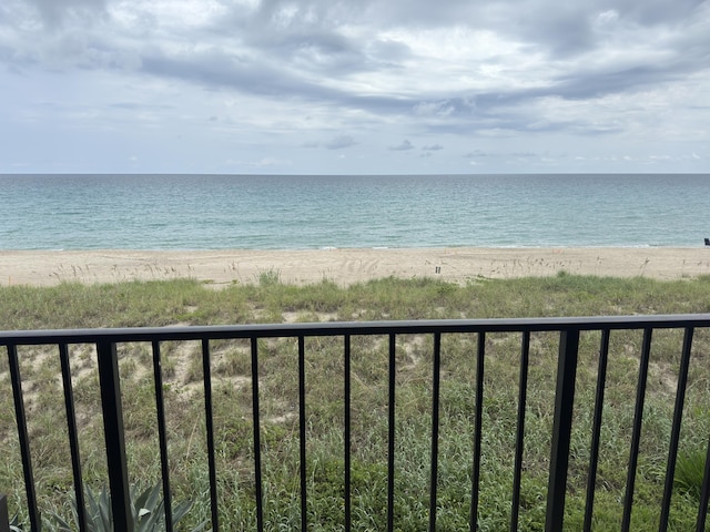 view of water feature with a beach view