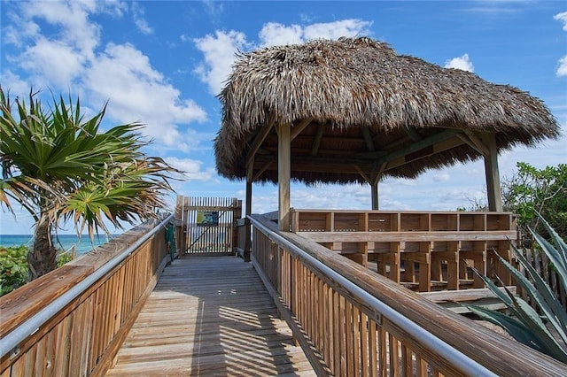 dock area featuring a gazebo and a water view