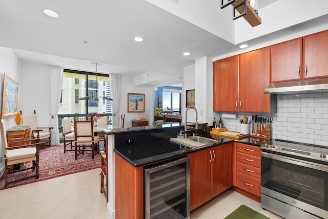 kitchen with decorative backsplash, stainless steel range with electric stovetop, light tile patterned floors, beverage cooler, and kitchen peninsula