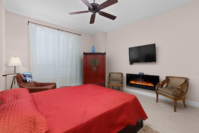 bedroom featuring ceiling fan and light tile patterned floors