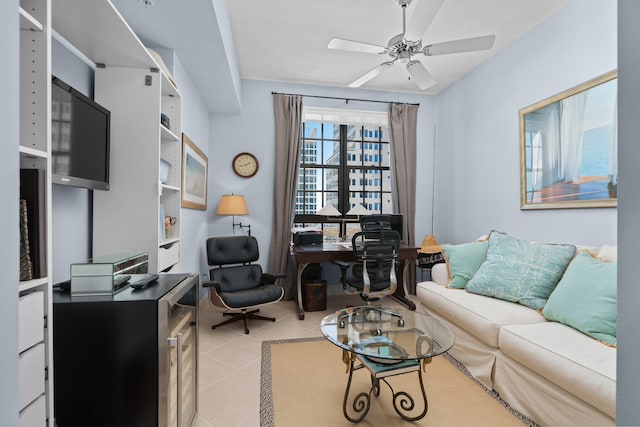 tiled living room with ceiling fan