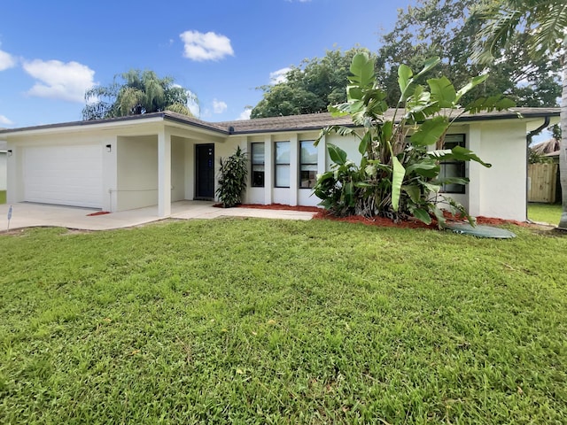 ranch-style house with a front lawn and a garage