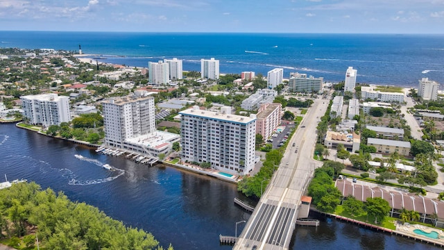 birds eye view of property featuring a water view