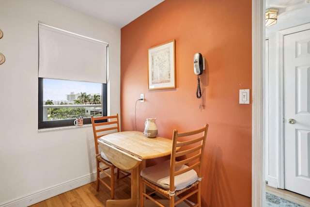 dining area with light wood-type flooring