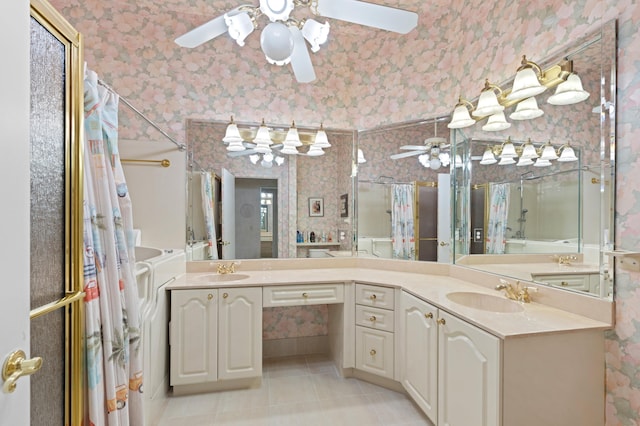 bathroom featuring ceiling fan, tile patterned flooring, vanity, and curtained shower