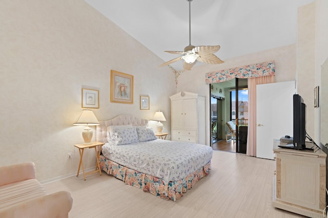 bedroom with ceiling fan, access to outside, high vaulted ceiling, and light hardwood / wood-style flooring