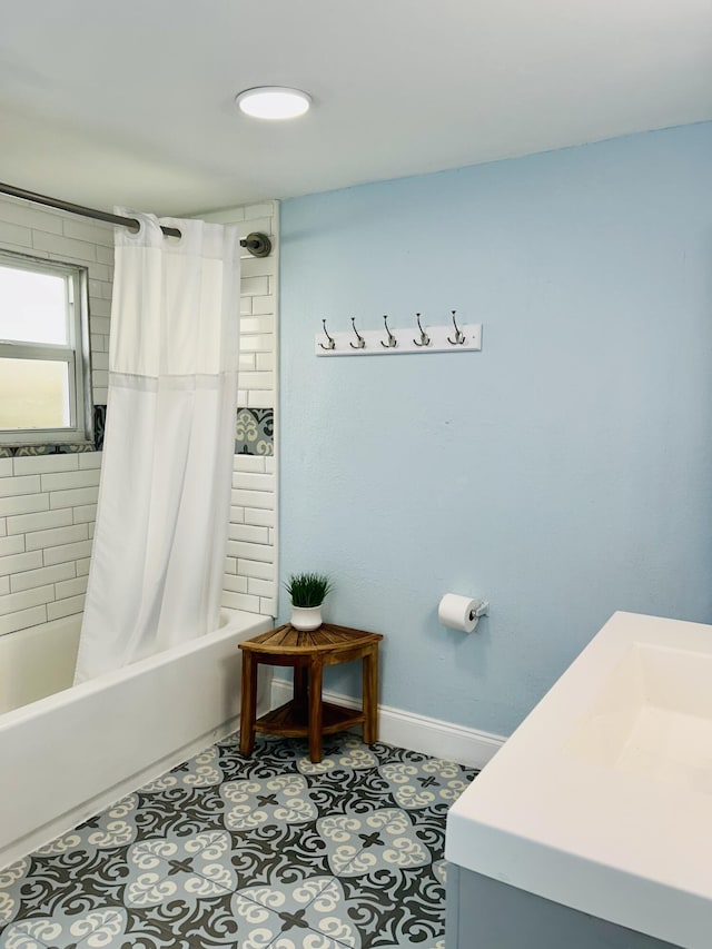 bathroom with tile patterned flooring and shower / bathtub combination with curtain