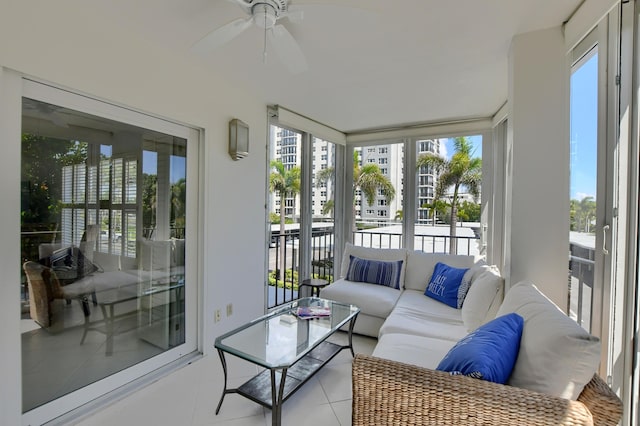 sunroom / solarium with ceiling fan and a healthy amount of sunlight