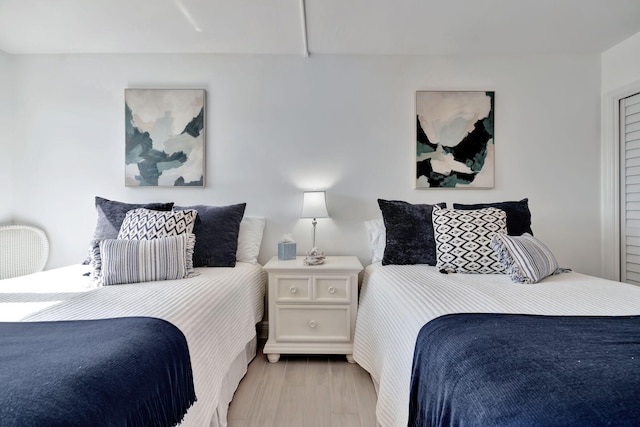 bedroom featuring light wood-type flooring