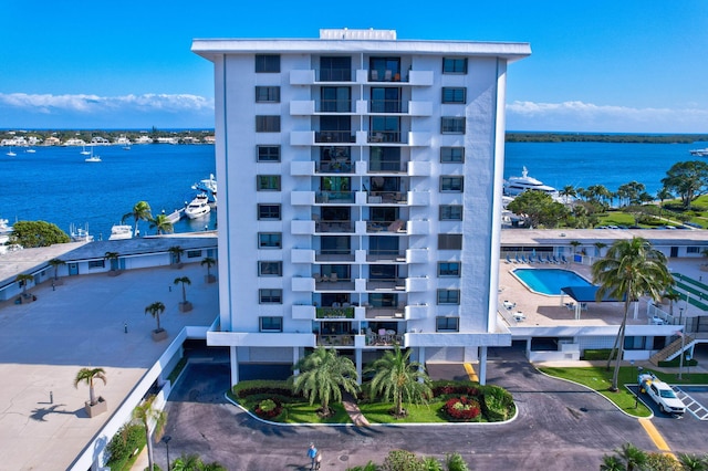 view of property with a water view