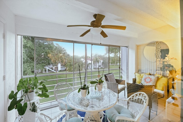 sunroom / solarium with ceiling fan