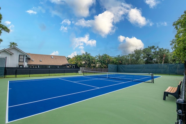 view of tennis court with basketball court