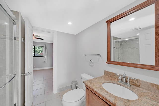 bathroom featuring ceiling fan, toilet, tile patterned flooring, and vanity