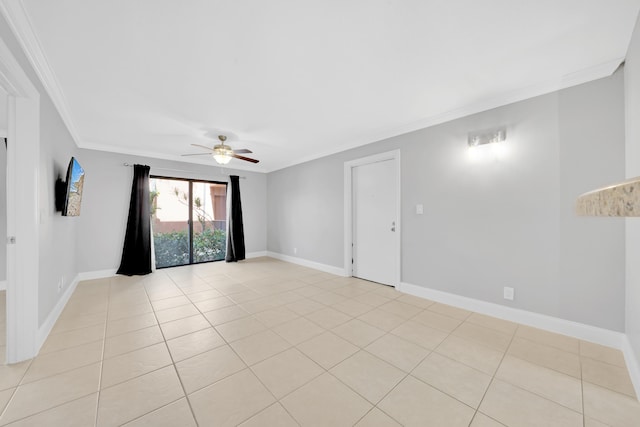 unfurnished room featuring ceiling fan, ornamental molding, and light tile patterned floors