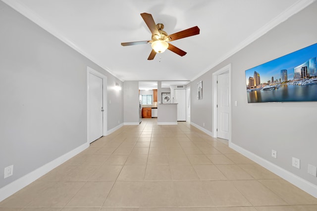 unfurnished living room featuring ceiling fan, light tile patterned flooring, and ornamental molding