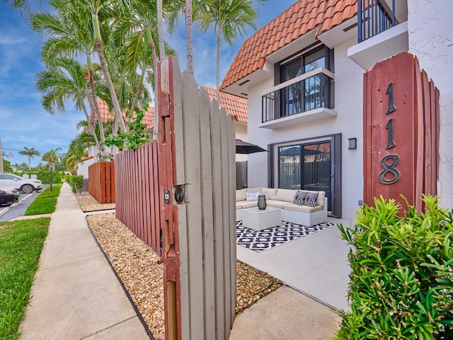 exterior space featuring a patio and an outdoor living space