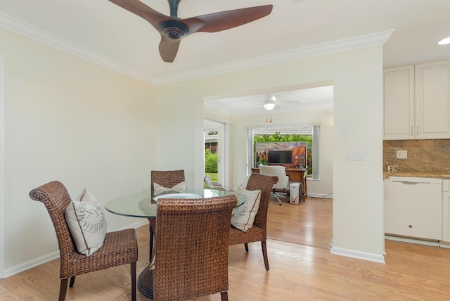 dining area featuring ornamental molding, ceiling fan, and light hardwood / wood-style floors