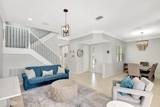 living room with a chandelier, visible vents, ornamental molding, and stairway