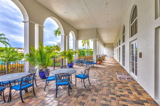 view of patio with outdoor dining area and french doors