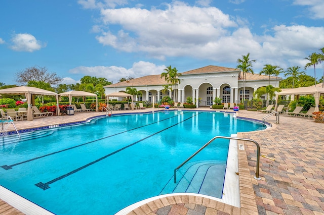 pool with a patio area