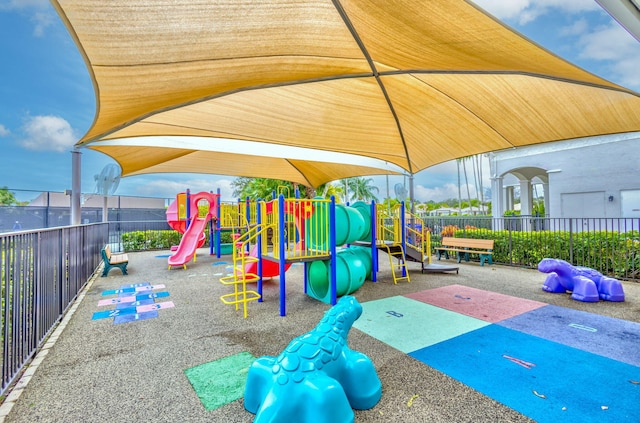 community play area featuring fence