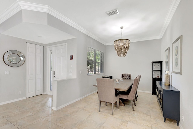 tiled dining area featuring an inviting chandelier and crown molding