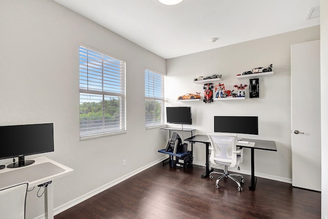 office space featuring wood finished floors and baseboards