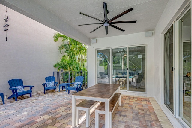 view of patio with ceiling fan