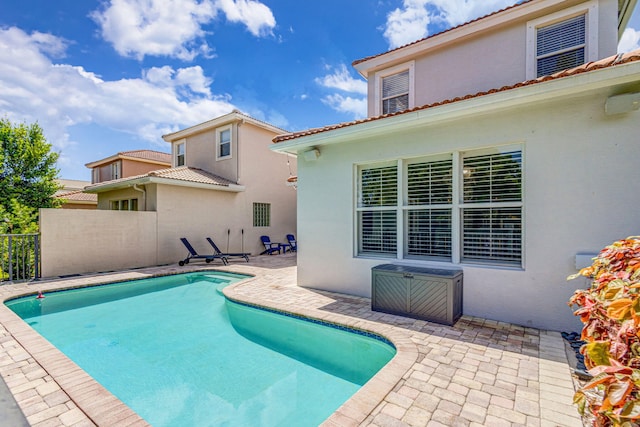 view of pool featuring a patio