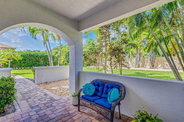 view of patio featuring fence