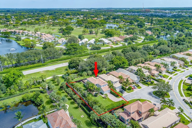 aerial view with a residential view and a water view