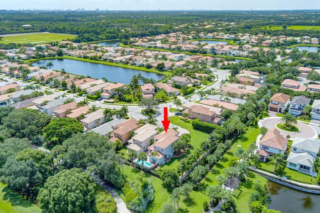 birds eye view of property featuring a water view